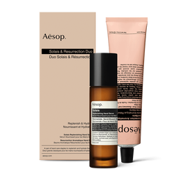 Un flacon pompe de Serum Nourrissant pour les Mains Solais  et un tube de Baume Aromatique Resurrection pour les Mains reunis dans un  coffret.