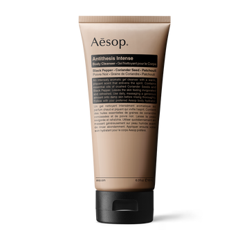 Aesop Antithesis Intense Body Cleanser tube on a light background.